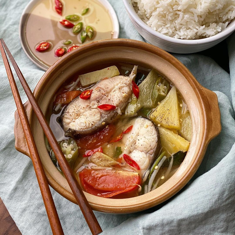 Mekong fish dishes served family-style after a successful catch